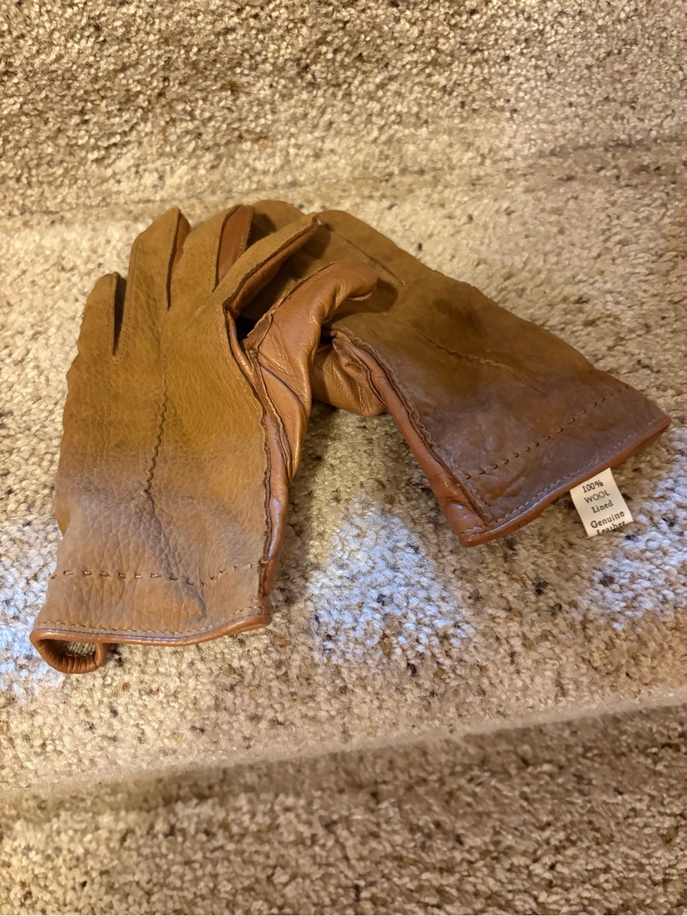 New wool lined & leather trimmed gloves. Pretty tan color.